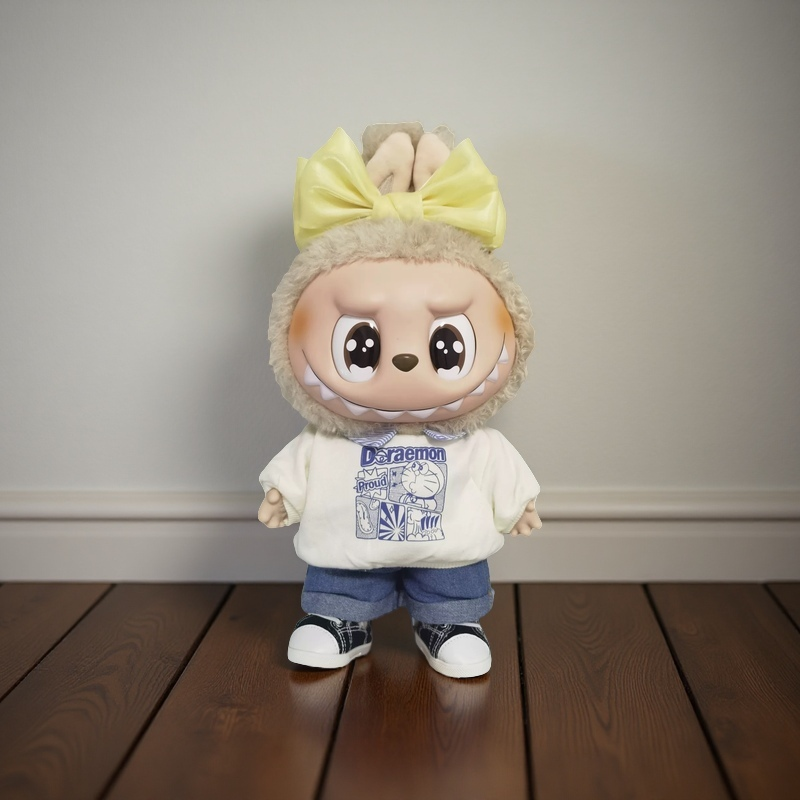 Labubu plush doll wearing a large yellow bow headband – cute accessory for 17cm and 38cm dolls, perfect for styling or display.