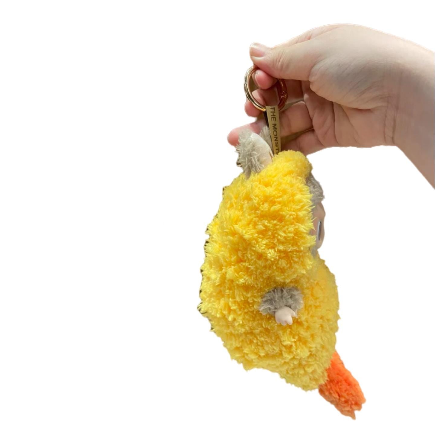Side view of Pop Mart Labubu fried shrimp costume. Fluffy yellow plush outfit showing ear and tail details, ideal cosplay clothes for 17cm Labubu doll.