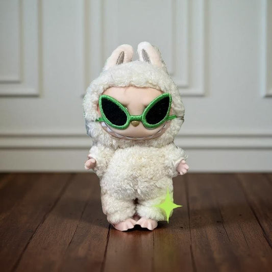Labubu doll wearing a fluffy bunny costume with oversized green cyberpunk sunglasses, posed on a wooden floor. Doll not included.