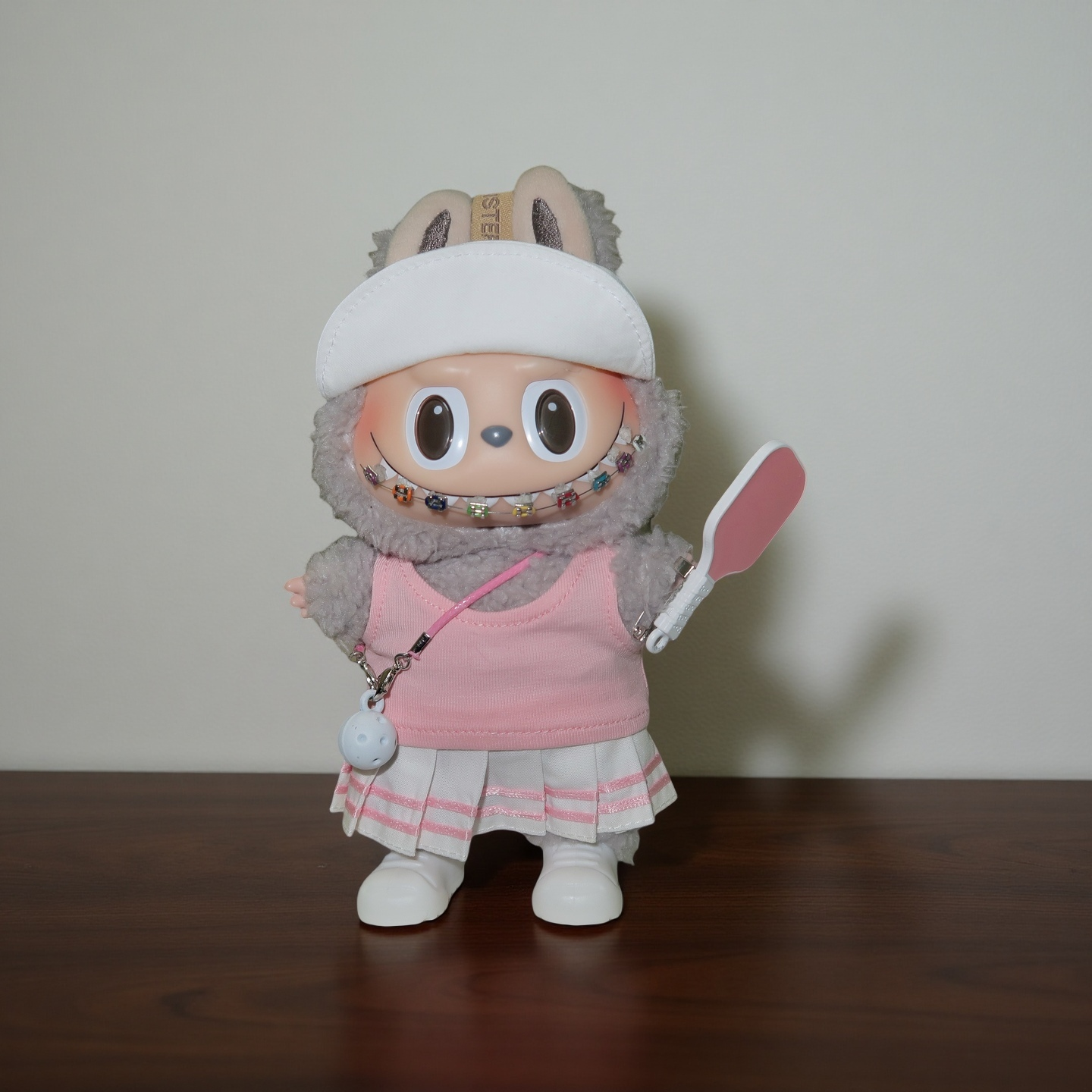 Labubu doll wearing pink pickleball outfit with white cap and paddle, Popanion handmade doll accessory